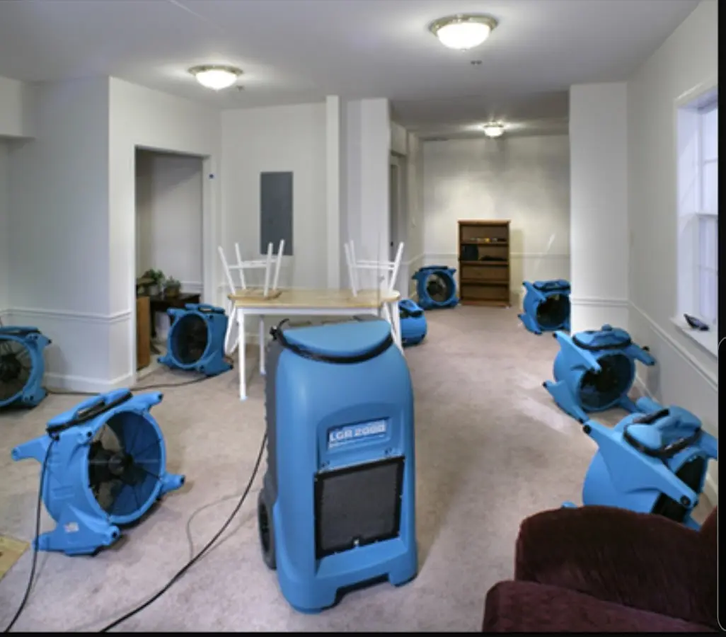 Air movers and dehumidifier setup for Water Damage Restoration in Butler